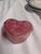 Heart-shaped decorative soap featuring a charming bow design. • Pink color with a glossy finish • Ideal for bathroom decor...