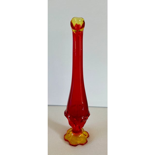 A beautiful and collectible swung glass vase in fiery and rare Amberina. The perfect holiday, or anytime, gift! Mint...