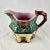 An English majolica pitcher shaped as a country cottage, by Warrilow & Cope – Wellington Pottery Works, Longton, Stoke-on-...