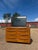 A beautifully sculpted vintage Heywood-Wakefield Encore dresser with the clean lines, warm wood tones, and sophisticated...