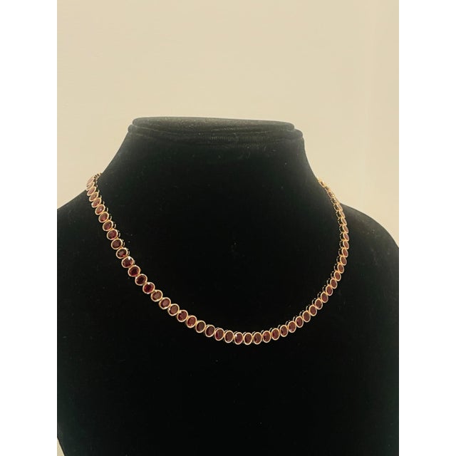 GEMSTONE DETAILS Gold Purity: 18K Solid Gold RUBY WEIGHT: 34.83 CTS 18K GOLD NET WEIGHT: 21.75 GRAMS GROSS WEIGHT: 28.72...