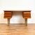 Writing desk was manufactured in Denmark in the 1950s-60s. It is made of teak wood and veneered on the top surface, the...