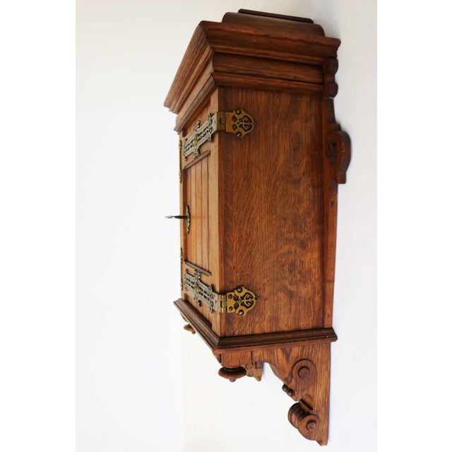 Arts & Crafts Hand-Carved Oak Wall Cabinet with Brass Details, 1900s For Sale - Image 4 of 18