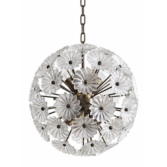 Italian Sputnik chandelier with 50 Murano pulegoso glass elements and a gold-plated metal frame, offered by...