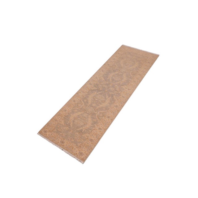 "Enhance the ambiance of your home with this magnificent Persian-influenced Turkish hand-knotted rug made by skilled...