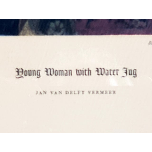 Beautiful quality vintage original offset print of Johannes Vermeer's "Woman With Water Jug" in lovely gold finish very...