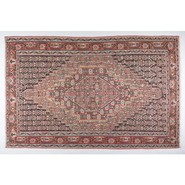 Vintage Handwoven Sene Kilim with Diamond Medallion & Floral Motifs – 5' 2'' x 7' 1'' This vintage handwoven Sene kilim...