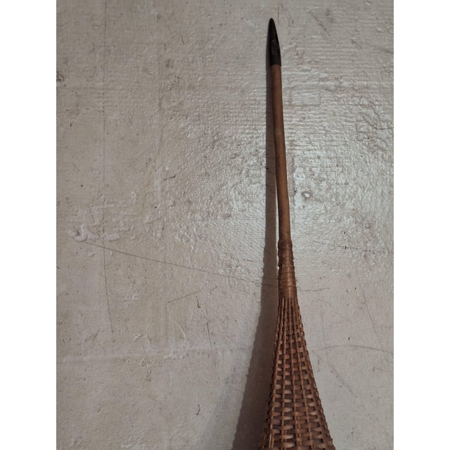 Mid-20th century European umbrella stand, likely French or Italian, featuring a beautifully handwoven wicker basket and an...