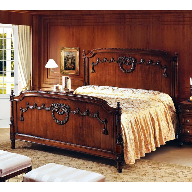 Handcrafted in Italy, this Louis XVI king size bed features a rich walnut finish and classic French styling. The headboard...