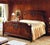 Handcrafted in Italy, this Louis XVI king size bed features a rich walnut finish and classic French styling. The headboard...