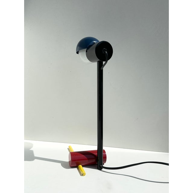 This rare and striking table lamp is a postmodern homage to the iconic L25 design (Schröder Lamp, 1925) by Dutch architect...