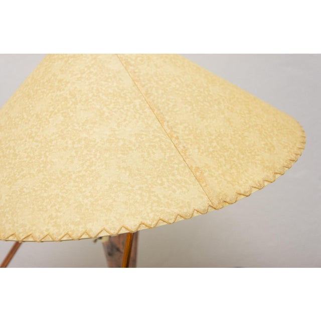 This elegant mid-century tripod table lamp was designed by helena frantová and produced in czechoslovakia during the 1950s...