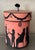 Vintage oval wallpaper box by Atelier of Hudson, New York with black Regency silhouettes on a pink ground. Depicts scenes...