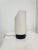 Beautiful minimalist design table lamp by Gerald Thurston for Lightolier. USA, 1960s. Cylindrical structure in cream-white...