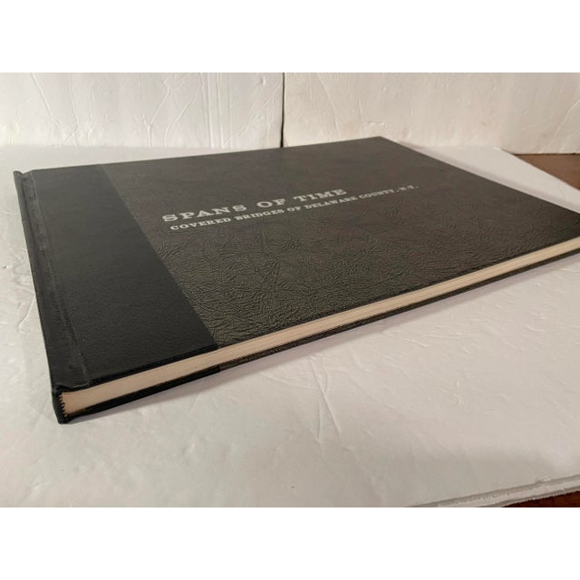 This vintage book titled "Spans of Time" is tells the stories about the historic bridges in Delaware County, NY. The first...