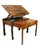 A fine piece of exceptional quality and condition. With a rectangular hinged top of the finest figured mahogany and...