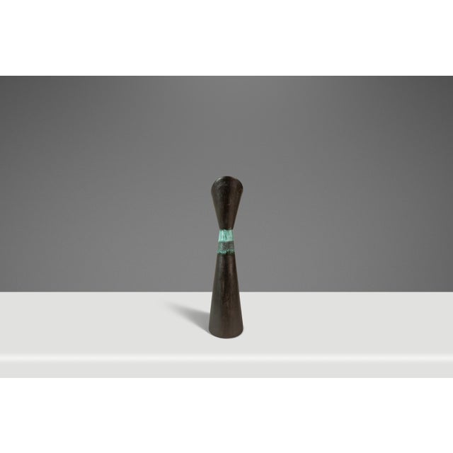 Introducing a splendid studio craft rough ceramic flower vase, that can also function as a serving pitcher, crafted from a...