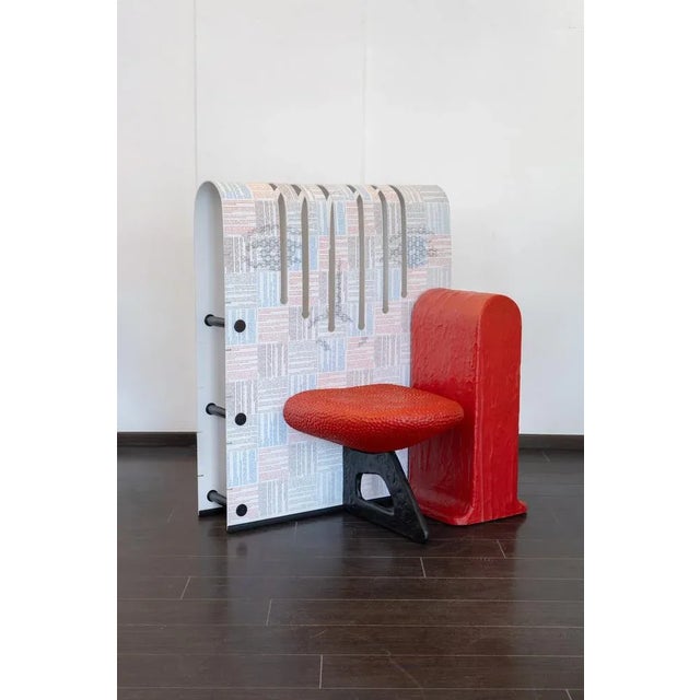 Armchair complete with armrest, model called "La smorfia" by Gaetano Pesce, in silicone and methacrylate, symbolizing an...
