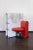 Armchair complete with armrest, model called "La smorfia" by Gaetano Pesce, in silicone and methacrylate, symbolizing an...