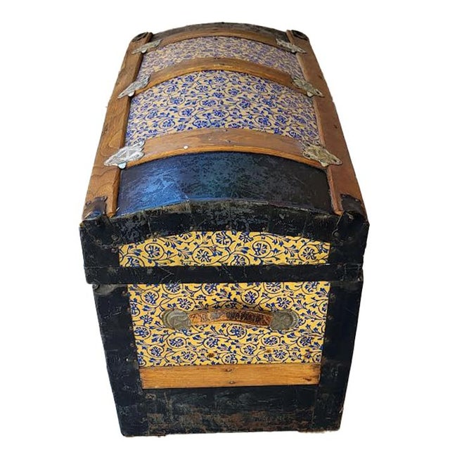 An exceptional late 19th-century Victorian humpback (dome top) packing trunk, distinguished by its uncommonly bright and...