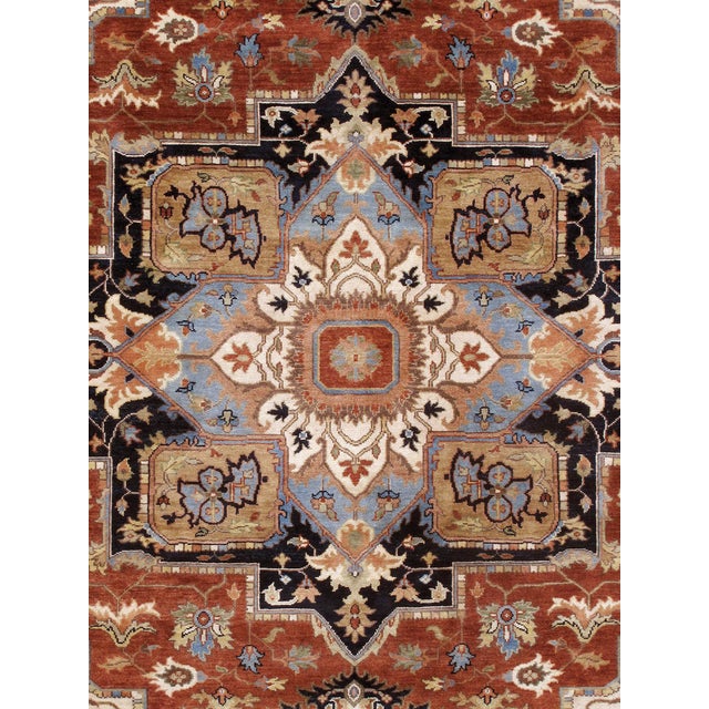 The Serapi Collection reinterprets traditional tribal geometric design through a refined palette. Each rug is hand-knotted...