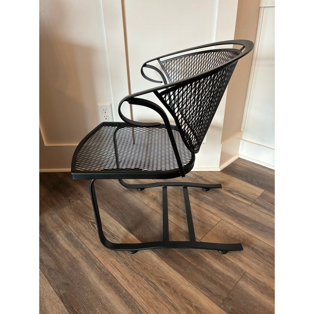 Mid Century mesh wrought iron Salterini Style outdoor chair. Recently refurbushed with rust proof paint, black matte...