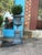 A distinguished pair of cast iron urns mounted on stands, each 41 inches in height with a 19-inch top diameter. These...