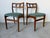 A beautiful pair of 1970s Danish Modern dining chairs by D-Scan, crafted in richly grained teak with the clean lines and...