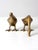 This is a pair of mid 20th century vintage brass geese figures. The brass birds have sleek modern lines with a lovely...