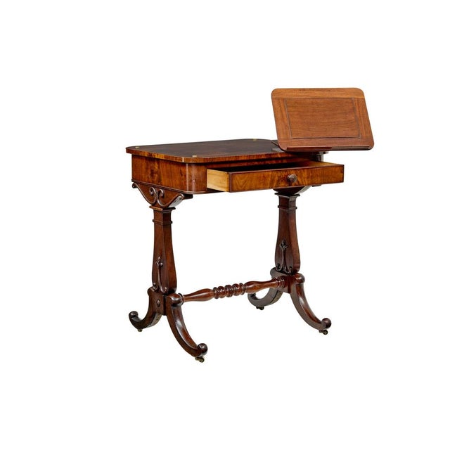mid 19th century writing table with folio stand circa 1860. we are pleased to offer this unusual english occasional...