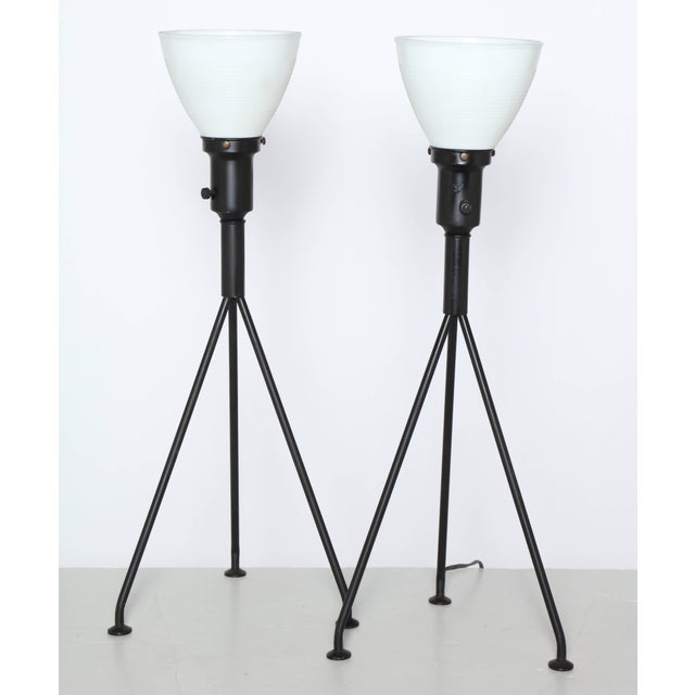 Pair of Gerald Thurston for Lightolier attributed Black Iron & White Glass Table Lamps, 1950s. Featuring balanced black...