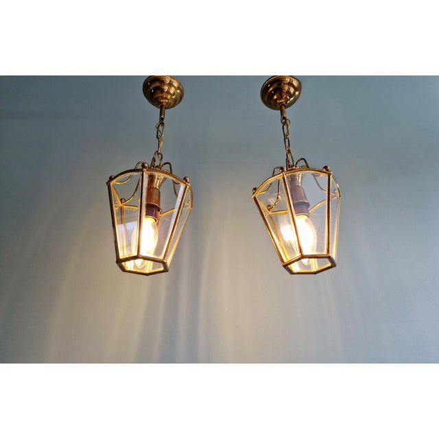 Pair of brass and beveled glass pendant lights/lanterns, 1950s-60s. Each light is compatible with an E14 LED bulb. Very...