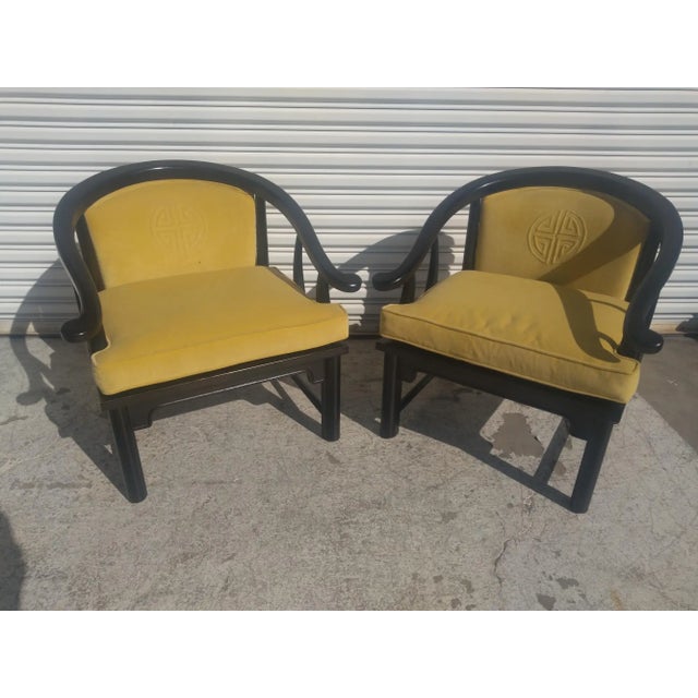 Pair of vintage Ming style Chin Hua Horseshoe lounge chairs by Century Furniture. These chairs have a luscious yellow...