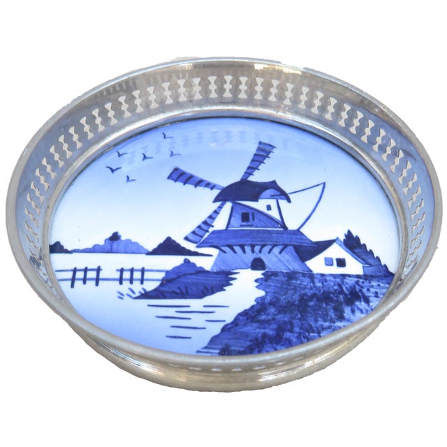 Charming set of antique porcelain beverage coasters featuring a Dutch coastal landscape. Blue & white porcelain center...