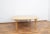 This wooden table was designed by Bruno Mathsson and produced by Fritz Hansen in 1985. The table is preserved in its...