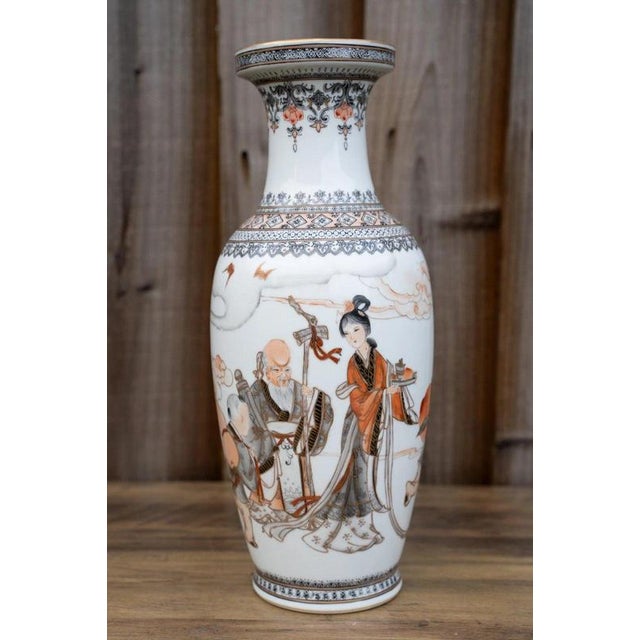 A highly decorative Chinese porcelain vase combining famille rose enamels with sophisticated grisaille and iron-red...