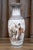 A highly decorative Chinese porcelain vase combining famille rose enamels with sophisticated grisaille and iron-red...
