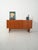 Scandinavian teak sideboard from the 1960s, with hinged doors and side drawers; the first drawer is a cutlery tray with...