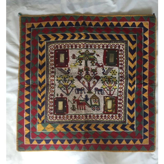 Vintage Hand-beaded Indian tribal panel with mirror accents, surrounded by chevron-striped silk originally used as a wall...