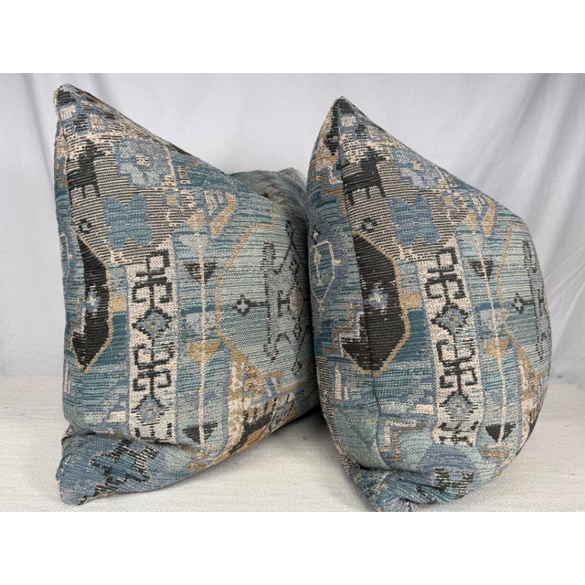 Custom pair of 22" pillows covered in a southwest patterned chenille fabric in blue, olive green and cream. These pillows...