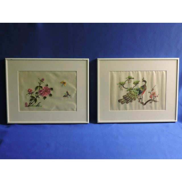 This pair of Chinese hand embroidered silk framed art pieces were made in Jingdezhen China and they were made in the...