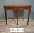 Elegant Louis XVI Style Mahogany and Green Felt Half-Moon Game Table This charming half-moon game table is a refined...