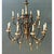 Exuding European elegance, this vintage twelve-light chandelier pairs hand-carved gilded woodwork with slender, sweeping...