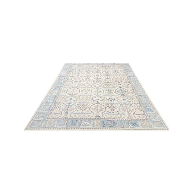 Experience the beauty of the 13x16 Turkish Oushak Area Rug, a unique addition to your home. Hand-loomed from high-quality...