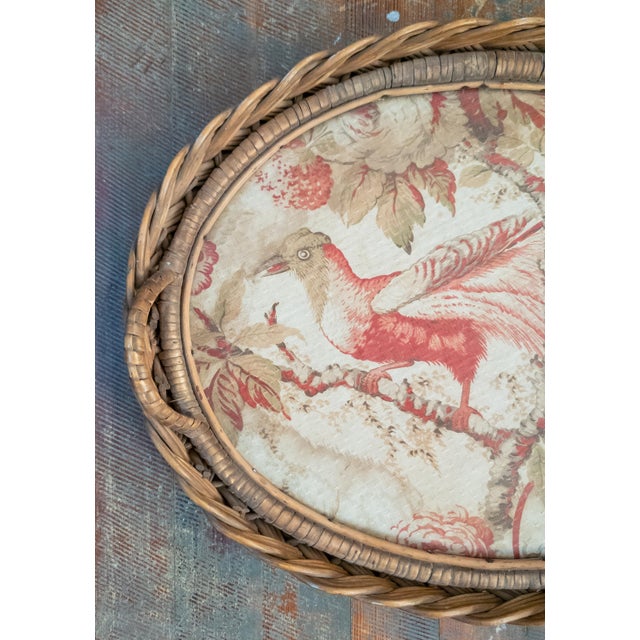 We are selling this great French Wicker serving tray. This tray has great oval form with braided wicker sides. The center...