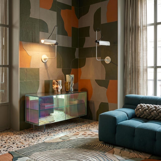 This pair presents the chrome-plated steel stem fixed to a circular white lacquered metal wall base, with an articulated...