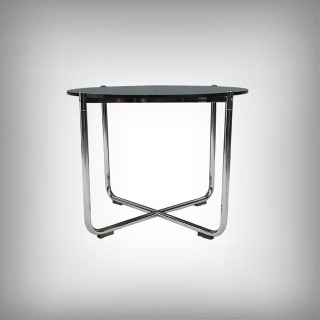 Created in 1927 for the villa tugendhat, the mr table is one of the first iconic pieces in the eponymous collection...