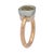 Pomellato's signature Nudo setting with highlighting a bezel set ,cushion-cut prasiolite — pale olive-green in tone — atop...
