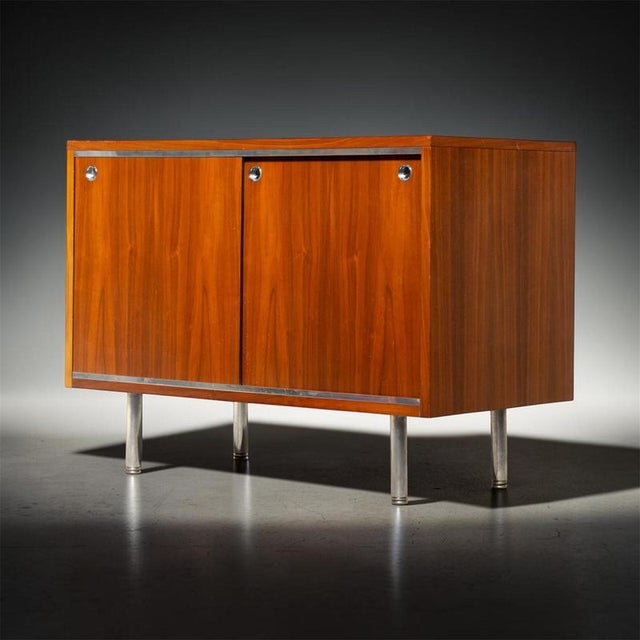 George nelson cabinet, herman miller edition. Small sideboard by george nelson (1908-1986) in walnut for herman miller...