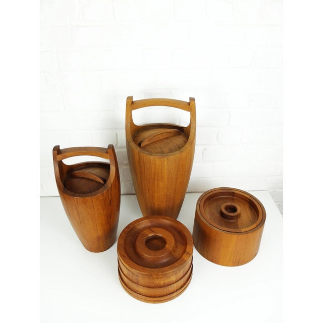 Scandinavian teak ice buckets from Dansk Designs, designed by Jens-Harald Quistgaard. Marked “Staved Teak Danmark JHQ”...